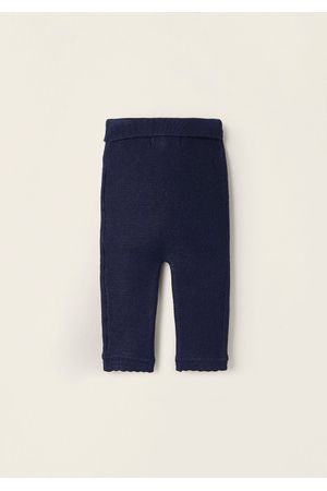 Pantalón tejidos con arco