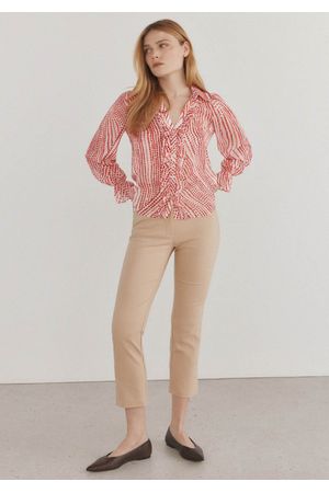 Blusa fluida con escote pico
