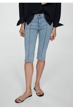 Jeans slim capri costuras decorativas