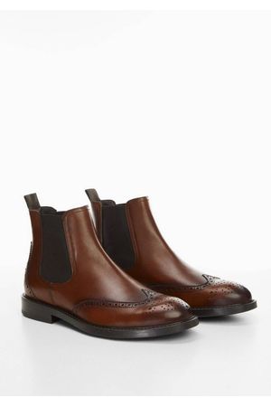 Botines chelsea de piel troquelada