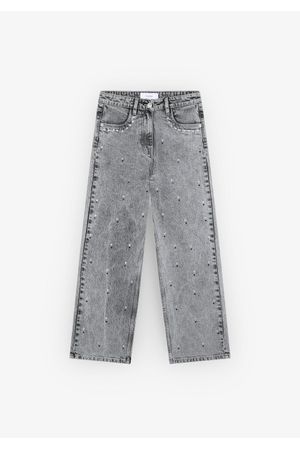 Jeans con tachuelas de estrella